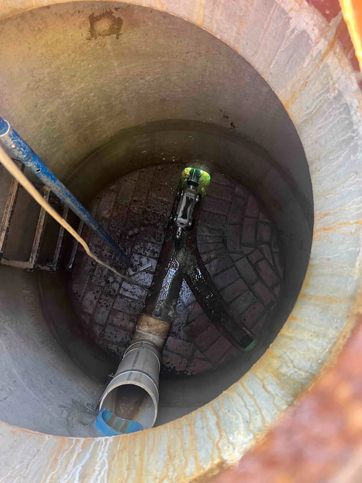 CCTV inspection equipment inside a sanitary sewer manhole