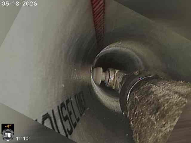 Cutter reopening a service connection through the cured liner